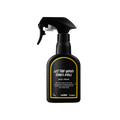 Let The Good Times Roll body spray. A black spray bottle of Lush "Let The Good Times Roll" Body Spray. The product label is black with a deep yellow banded border. White text states the product name and the scent description.