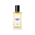 A glass perfume bottle filled with light amber liquid. A white label reads 'American Cream'.