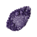 Little Sparkler Glitter Crumble. A neatly smudged swatch of crumbly, shimmering, violet-purple, metallic eyeshadow.