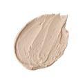 Me Time. A neatly smeared swatch of thick, creamy beige face mask with a matte finish and visible swooping peaks from being spread.