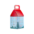 Moominhouse product holder. A house-shaped gift box designed to look like the blue Moomin house, featuring a scalloped red roof with a built-in carrying handle. Illustrated characters peek from windows.
