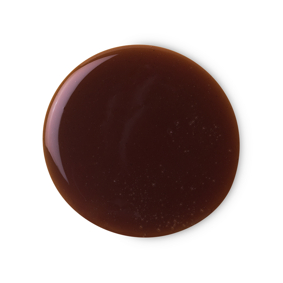 Posh Chocolate. A perfectly circular swatch of thick, glossy, caramel-chocolate-coloured shower gel.