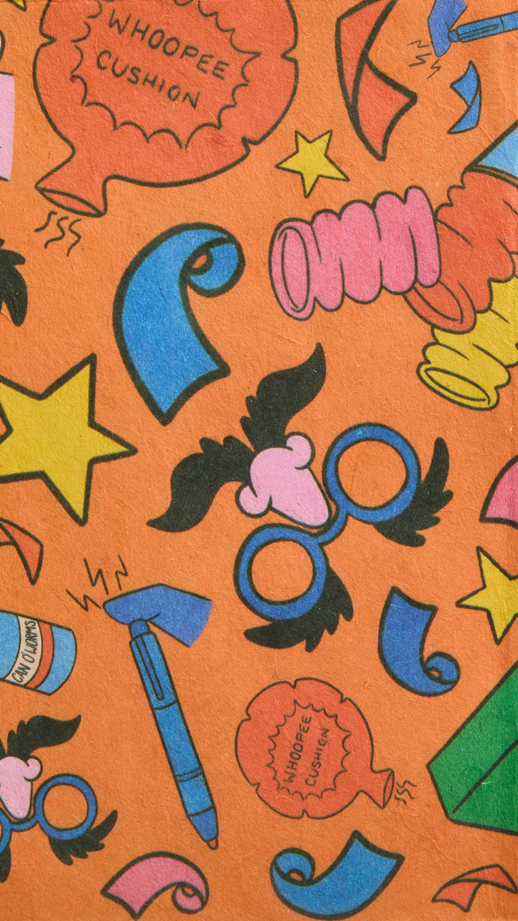 The image shows a s super close-up shot of the brightly coloured Practical Joker lokta paper wrap focusing on the textured surface of the material and crisp illustrations.