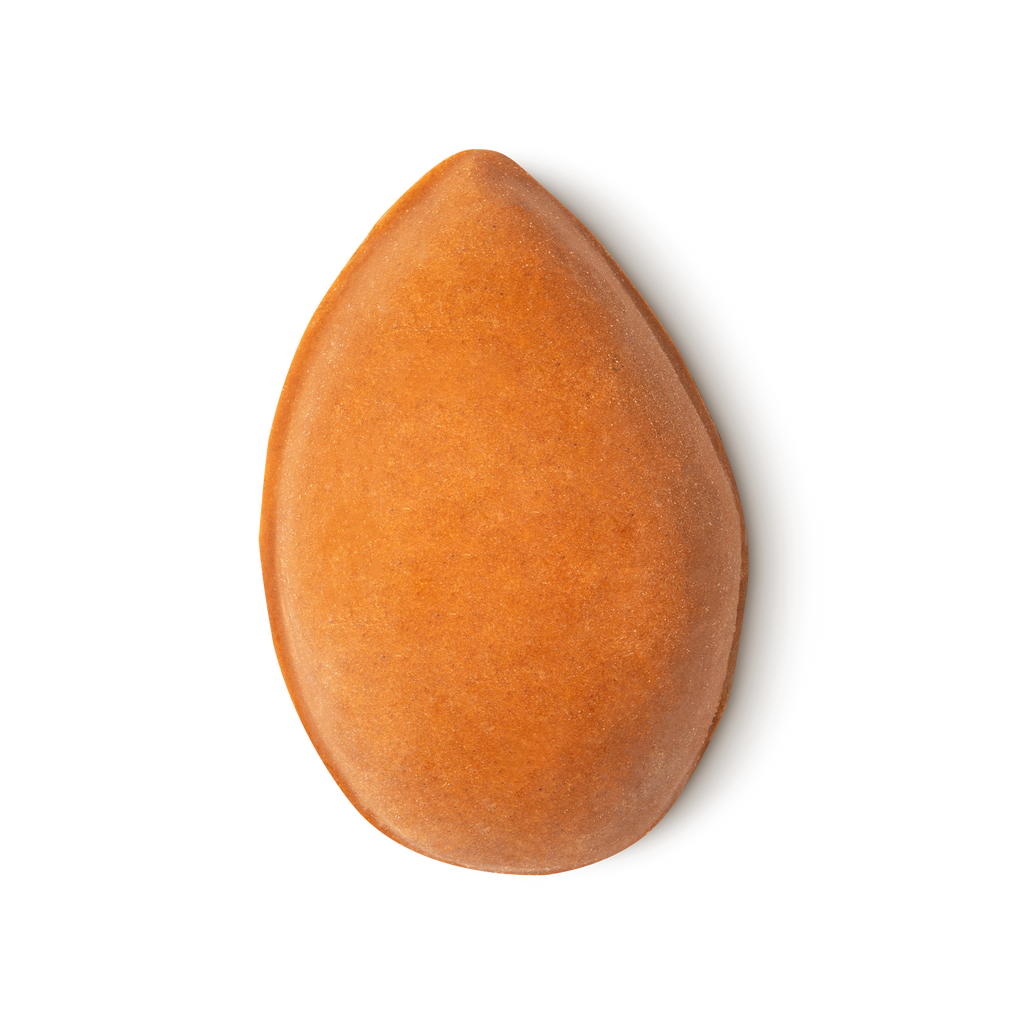 Pumice Power. A rust orange, teardrop shaped, roughly textured soap.