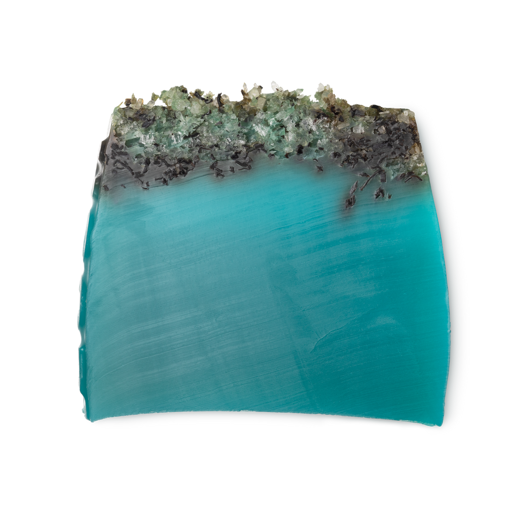 Sea Vegetable. A turquoise, trapezium shaped soap, topped with black arame seaweed and coarse sea salt.
