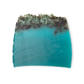 Sea Vegetable. A turquoise, trapezium shaped soap, topped with black arame seaweed and coarse sea salt.