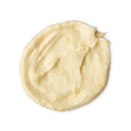 St Clements. A rounded, smeared swatch of thick, pale yellow hair treatment mask with a smooth, slightly textured finish. The swatch shows visible streaks from being spread.