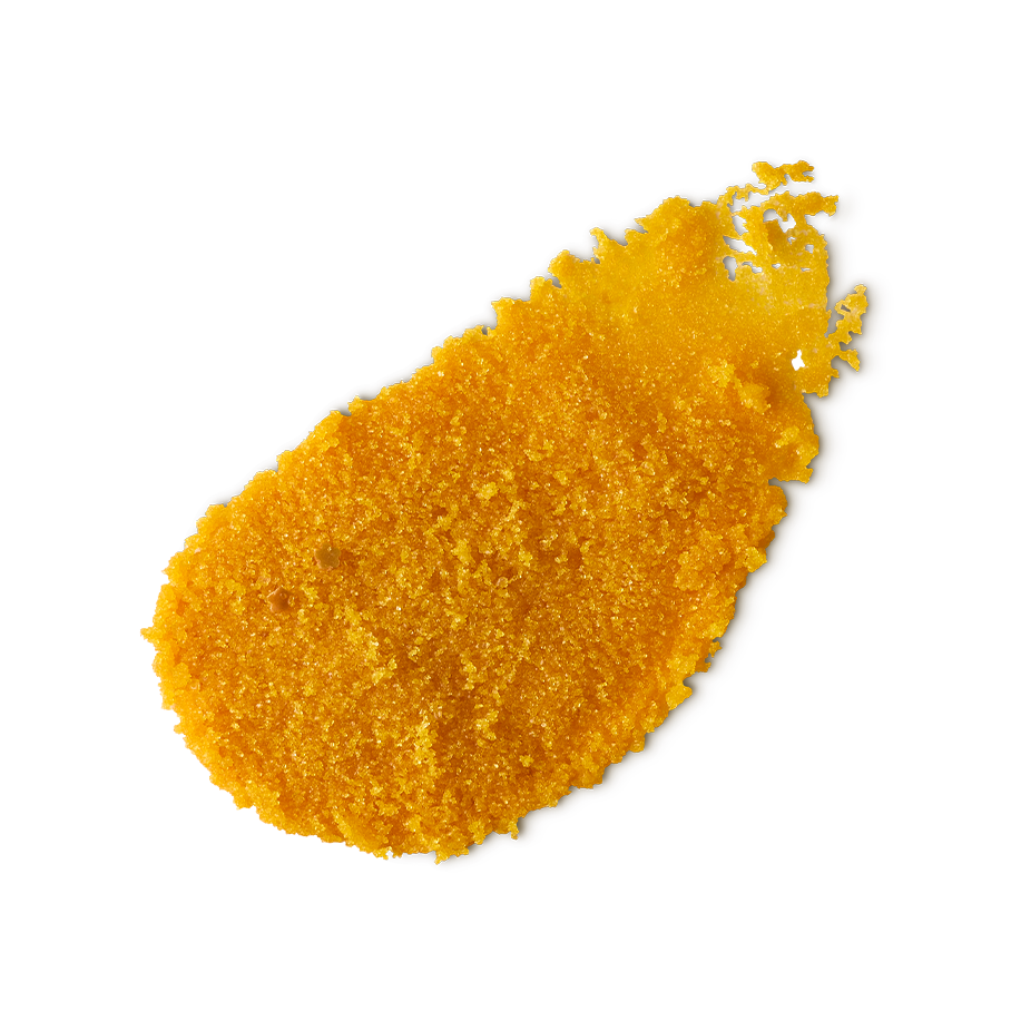 Sticky Dates. A neatly smeared swatch of thick, textured golden-yellow lip scrub with visible granulated sugar for exfoliation.