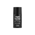 Vegan Leather Jacket. A short, cylindrical black push-up tube of the Vegan Leather Jacket solid perfume with a black label on the front covering the cap, with the product name and scent printed on it.