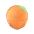 A spherical, bright orange Peachy Bath Bomb with a small green leaf detail at the top, set against a solid black background.