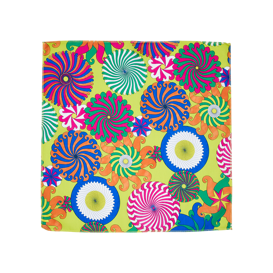 Whirly Swirly. This knot wrap shows multiple colourful, pinwheel-style, almost psychedelic, swirling circles on a calm green.