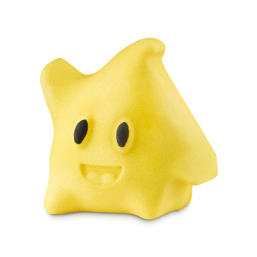 A yellow, star-shaped bubble bar modeled after a Luma from Super Mario. It has small black eyes and a carved smiling mouth.